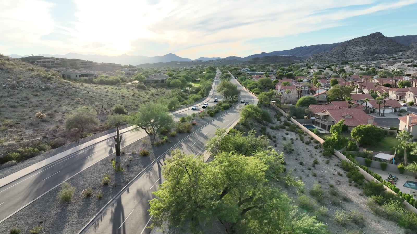 Rooftops along a road leading toward the ridge in Ahwatukee
